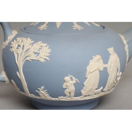 57 - A WEDGWOOD BLUE JASPER TEAPOT AND COVER, modern, with classical figure sprigging, together with a si... 