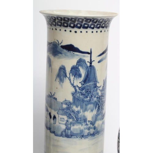 6 - A PAIR OF CHINESE PORCELAIN GU VASES painted in underglaze blue with prunus on a dark shaded ground,... 