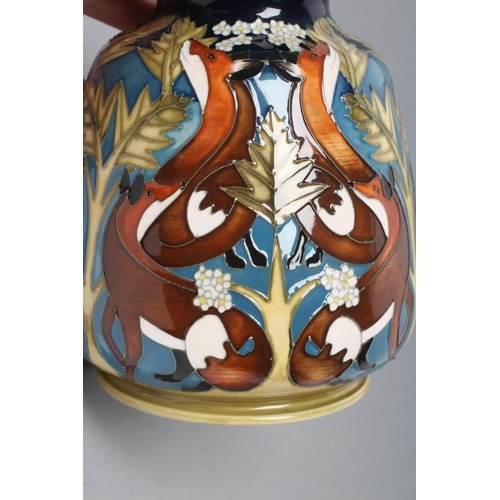 65 - A MOORCROFT POTTERY 