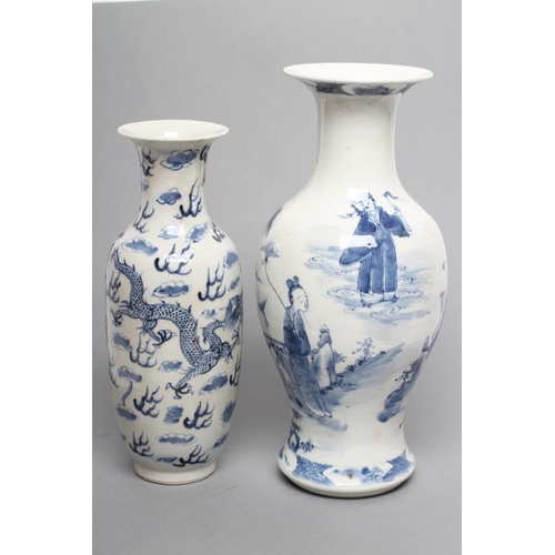 8 - TWO CHINESE PORCELAIN VASES, the larger of inverted baluster form painted in underglaze blue with tr... 