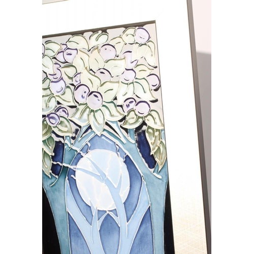 85 - A MOORCROFT POTTERY OBLONG PLAQUE, 2018, tubelined in grey and painted in shades of blue, green and ... 