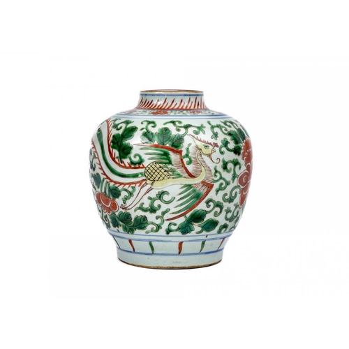 9 - A CHINESE PORCELAIN FAMILLE VERTE JAR of ovoid form, on-glaze painted with dragons and large chrysan... 