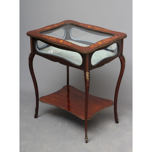 668 - A MAHOGANY AND FLORAL MARQUETRY BIJOUTERIE TABLE, late 19th century, of oblong serpentine form with ... 