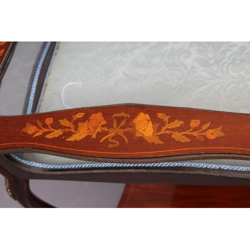 668 - A MAHOGANY AND FLORAL MARQUETRY BIJOUTERIE TABLE, late 19th century, of oblong serpentine form with ... 