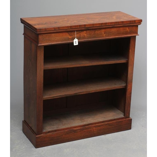 672 - A SMALL REGENCY ROSEWOOD OPEN BOOKCASE, early 19th century, the moulded edged top over shallow friez... 