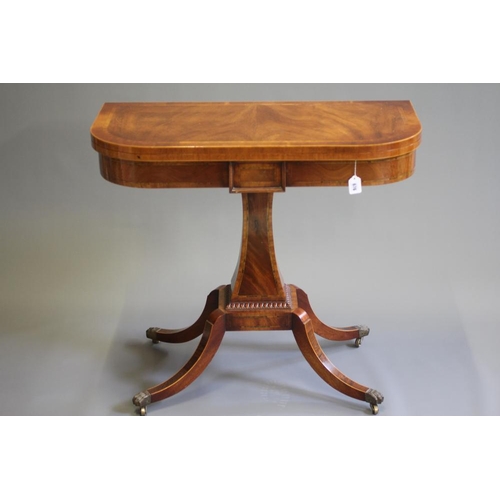 676 - A REGENCY STYLE FOLDING CARD TABLE, modern, of D form with rosewood banding and stringing, the swive... 