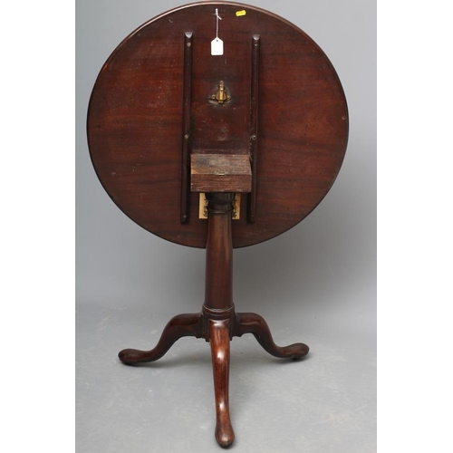 678 - A GEORGIAN MAHOGANY TRIPOD TABLE, third quarter 18th century, the circular tilt top on turned gun ba... 