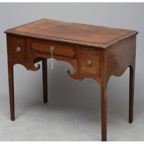 679 - AN OAK AND MAHOGANY LOW BOY, late 19th century, the reel edged and banded top centred by a marquetry... 