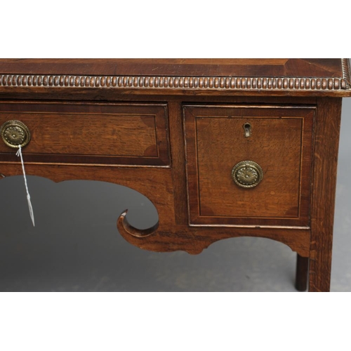 679 - AN OAK AND MAHOGANY LOW BOY, late 19th century, the reel edged and banded top centred by a marquetry... 