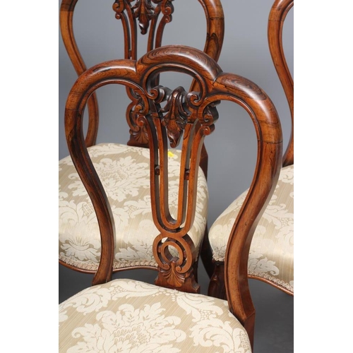 680 - A SET OF SIX VICTORIAN ROSEWOOD DINING CHAIRS of balloon back form upholstered in cream silk damask,... 