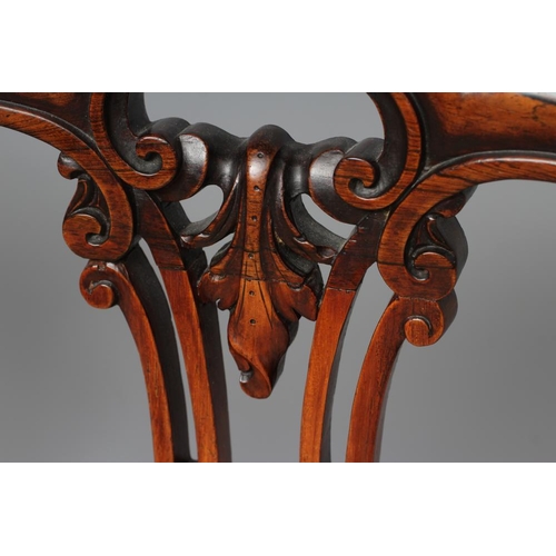 680 - A SET OF SIX VICTORIAN ROSEWOOD DINING CHAIRS of balloon back form upholstered in cream silk damask,... 