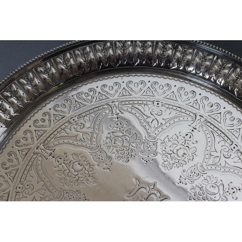 145 - A VICTORIAN SMALL SILVER SALVER, maker Aldwinkle & Slater, London 1881, of plain circular form with ... 