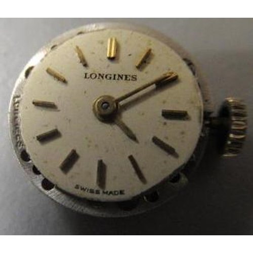 178 - A LADY'S 9CT GOLD LONGINES WRISTWATCH, the silvered dial with applied metal batons, the seventeen je... 