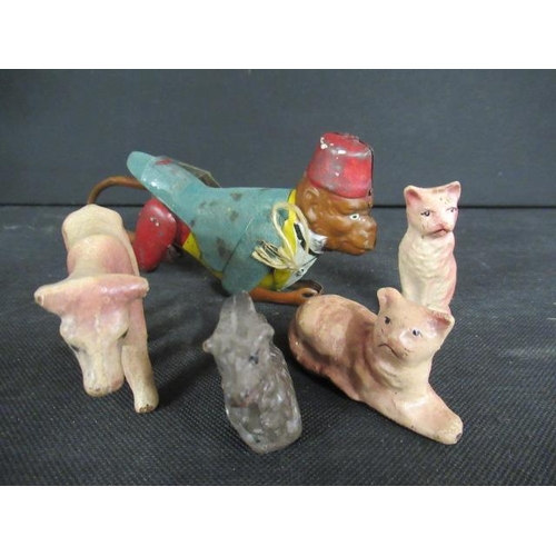 FOUR PAPIER MACHE ITEMS AND A MONKEY FIGURE