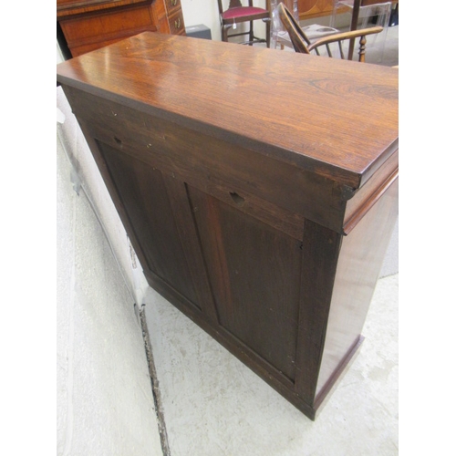 672 - A SMALL REGENCY ROSEWOOD OPEN BOOKCASE, early 19th century, the moulded edged top over shallow friez... 