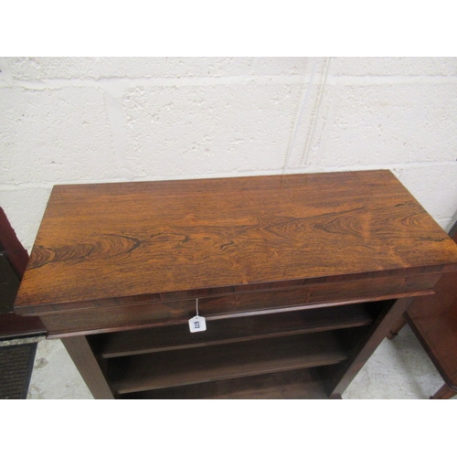 672 - A SMALL REGENCY ROSEWOOD OPEN BOOKCASE, early 19th century, the moulded edged top over shallow friez... 