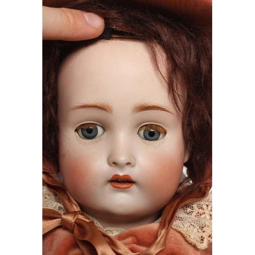 11 - A possible Kestner bisque socket head doll, with blue glass sleeping eyes, open mouth, applied top t... 