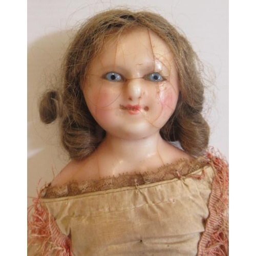 112 - Two Victorian wax shoulder head dolls, comprising a 16 1/2