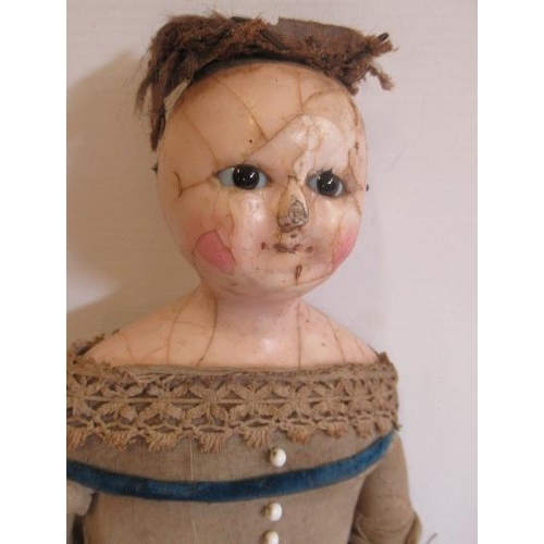 112 - Two Victorian wax shoulder head dolls, comprising a 16 1/2