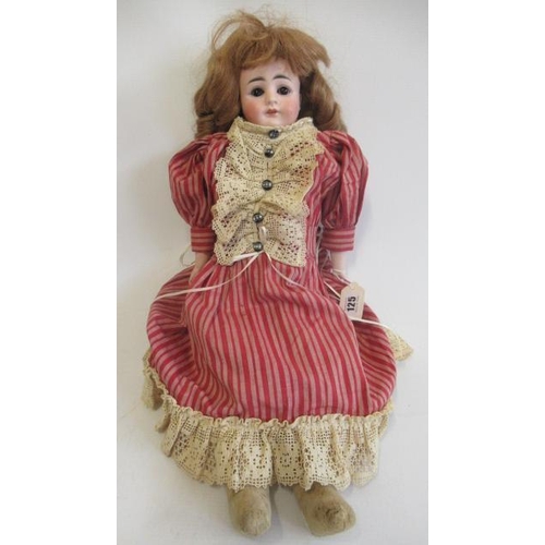 125 - A German bisque shoulder head doll, possibly Kestner, with brown glass sleeping eyes, open mouth, te... 