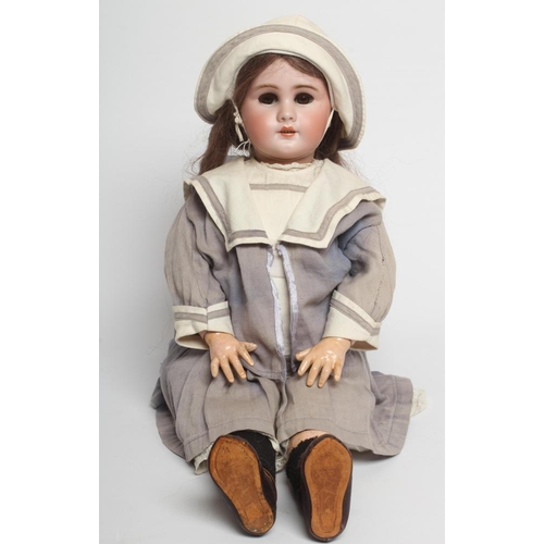 128 - A Bebe Jumeau bisque socket head doll, with brown glass sleeping eyes, open mouth, moulded teeth, pi... 