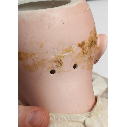 128 - A Bebe Jumeau bisque socket head doll, with brown glass sleeping eyes, open mouth, moulded teeth, pi... 