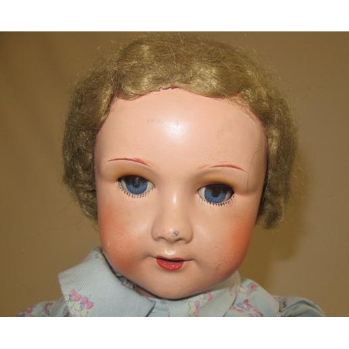 129 - A French walking doll, with composite socket head, blue sleeping eyes, open mouth, mamma voicebox, w... 