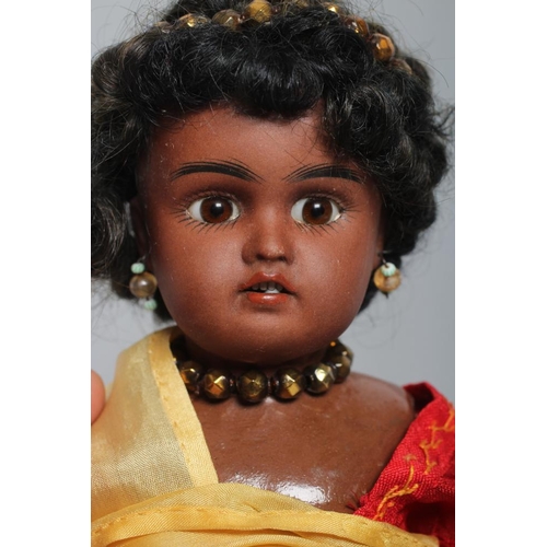 140 - A Bahr & Proschild bisque socket head doll, with brown glass fixed eyes, open mouth, teeth, pierced ... 