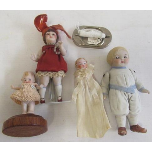 143 - Five small all bisque dolls, including a 5