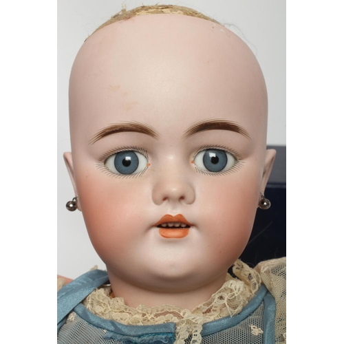 147 - A Simon & Halbig bisque socket head doll, with blue glass fixed eyes, open mouth, moulded teeth, pie... 