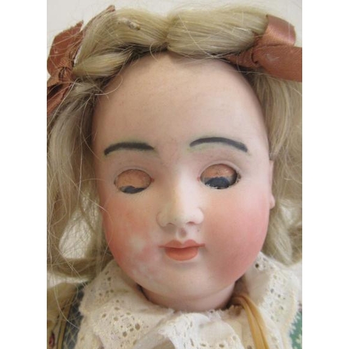 152 - A French bisque socket head doll, with blue glass sleeping eyes, closed mouth, blond wig, compositio... 