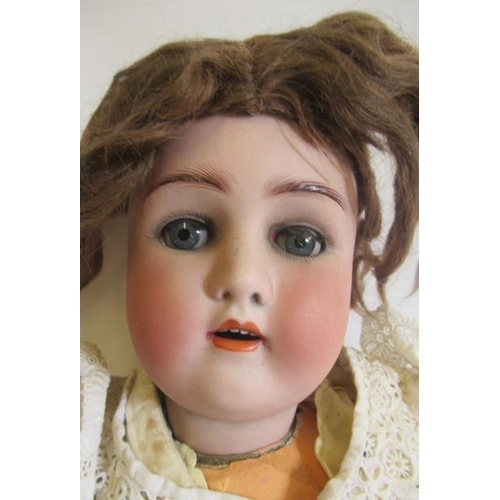 16 - An Alt, Beck & Gottschalck bisque socket head doll, with blue glass sleeping eyes, open mouth, teeth... 