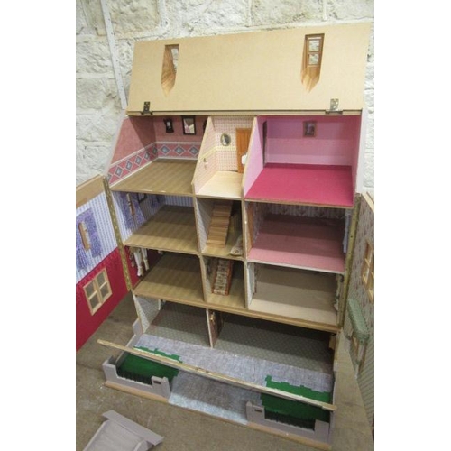 162 - A large Georgian style doll's house, with 11 internal spaces on 4 floors including the attic and cel... 