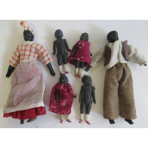 184 - Six all bisque miniature black dolls, the four smaller dolls of six piece construction with painted ... 