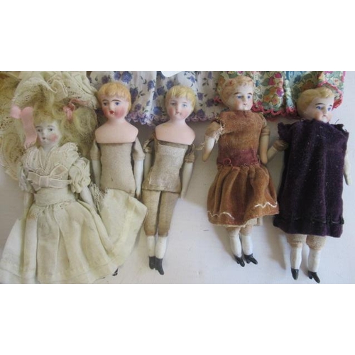 189 - Eight miniature dolls, comprising four 5