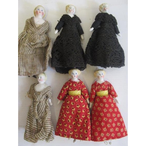 190 - Six bisque shoulder head doll's house dolls, comprising three pairs, all with moulded hair, ceramic ... 