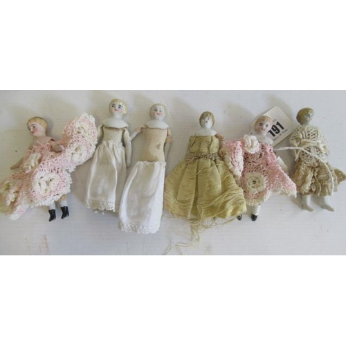 191 - Six ceramic shoulder head doll's house dolls, comprising three pairs, all with moulded hair, ceramic... 