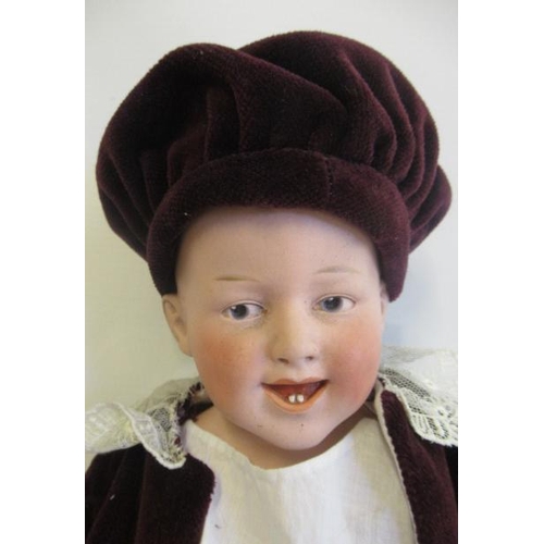 199 - A Gebruder Heubach bisque shoulder head character boy doll, with moulded hair, moulded open mouth, t... 