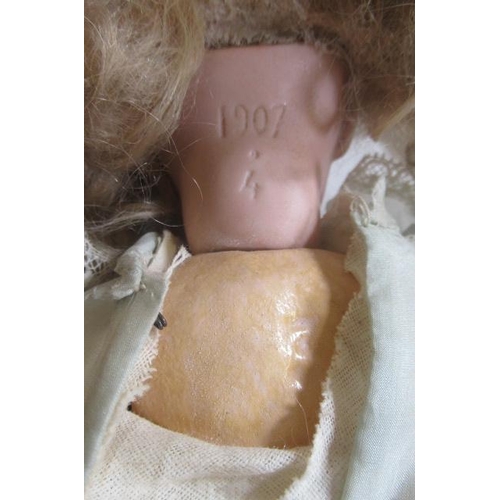 201 - A possible Jumeau bisque socket head doll, with blue glass sleeping eyes, open mouth, teeth, pierced... 