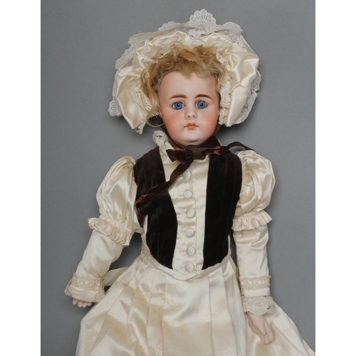 202 - A Simon & Halbig bisque jointed neck shoulder head doll, with blue glass fixed eyes, closed mouth, p... 