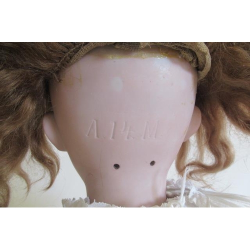 203 - A large Armand Marseille bisque socket head doll, c.1880, with blue glass sleeping eyes, open mouth,... 