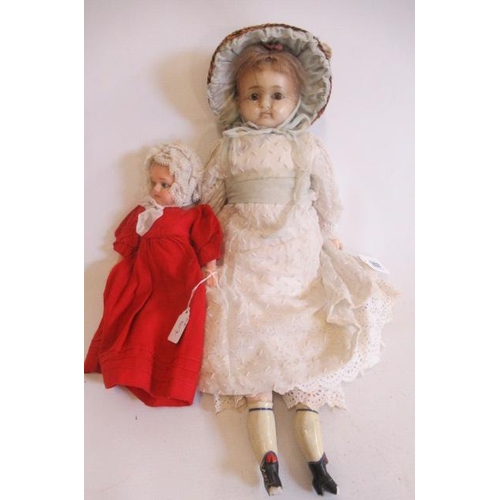 207 - Two Victorian wax shoulder head dolls, one 18 1/2