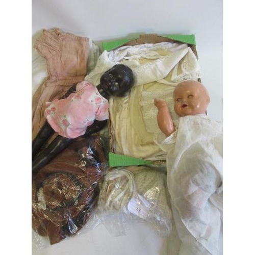 209 - A large quantity of good quality doll's clothing, including dresses, velvet outfit and christening g... 