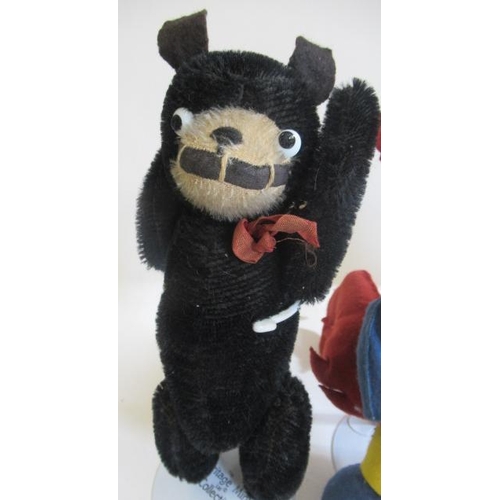 212 - Dismal Desmond, with US trademark stamp, together with two felt animals and a plush Felix the Cat, t... 