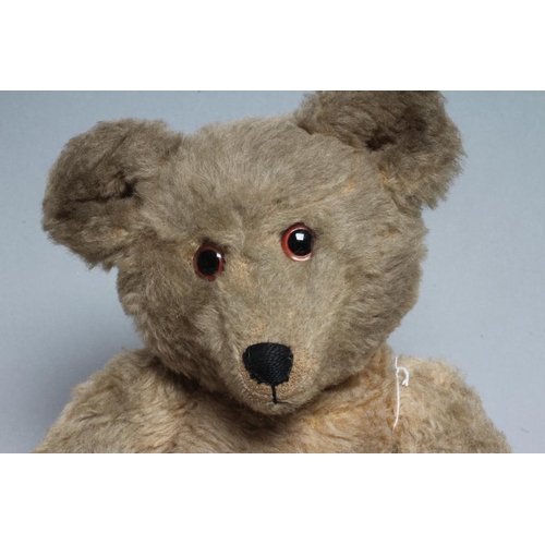 214 - A pre-war German Joppi type musical teddy bear, with bellows movement, pink glass eyes, yellow plush... 