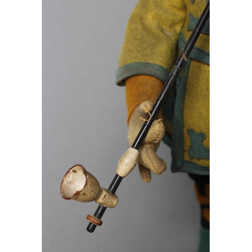 22 - A rare pre-war Lenci opium seller doll, jointed shoulders, hips and neck, felt body and clothing, in... 