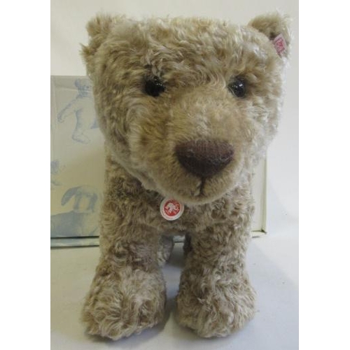 237 - A boxed Steiff Grizzly bear, standing on four legs, 56cm long (Est. plus 21% premium inc. VAT)