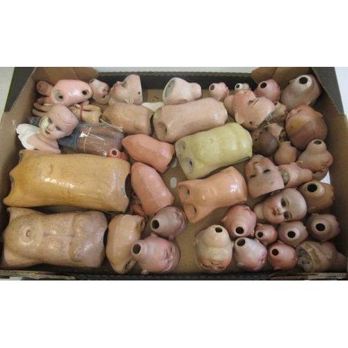 24 - A large collection of bisque and composition doll parts (Est. plus 21% premium inc. VAT)