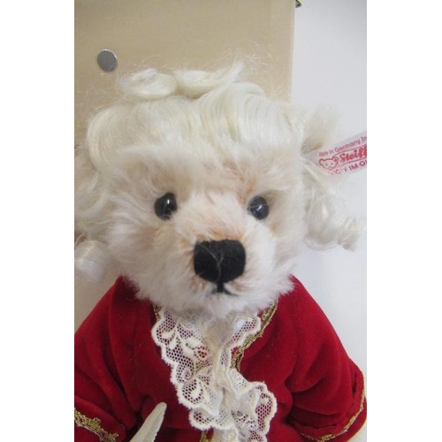 254 - A boxed Mozart teddy bear, dressed as the composer, with certificate, 28cm (Est. plus 21% premium in... 