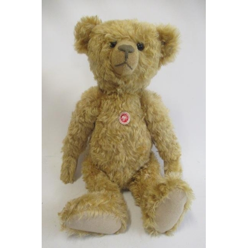 259 - A large Steiff replica bear, 2004 edition, with button eyes, felt pads, chest label, grey metal ear ... 